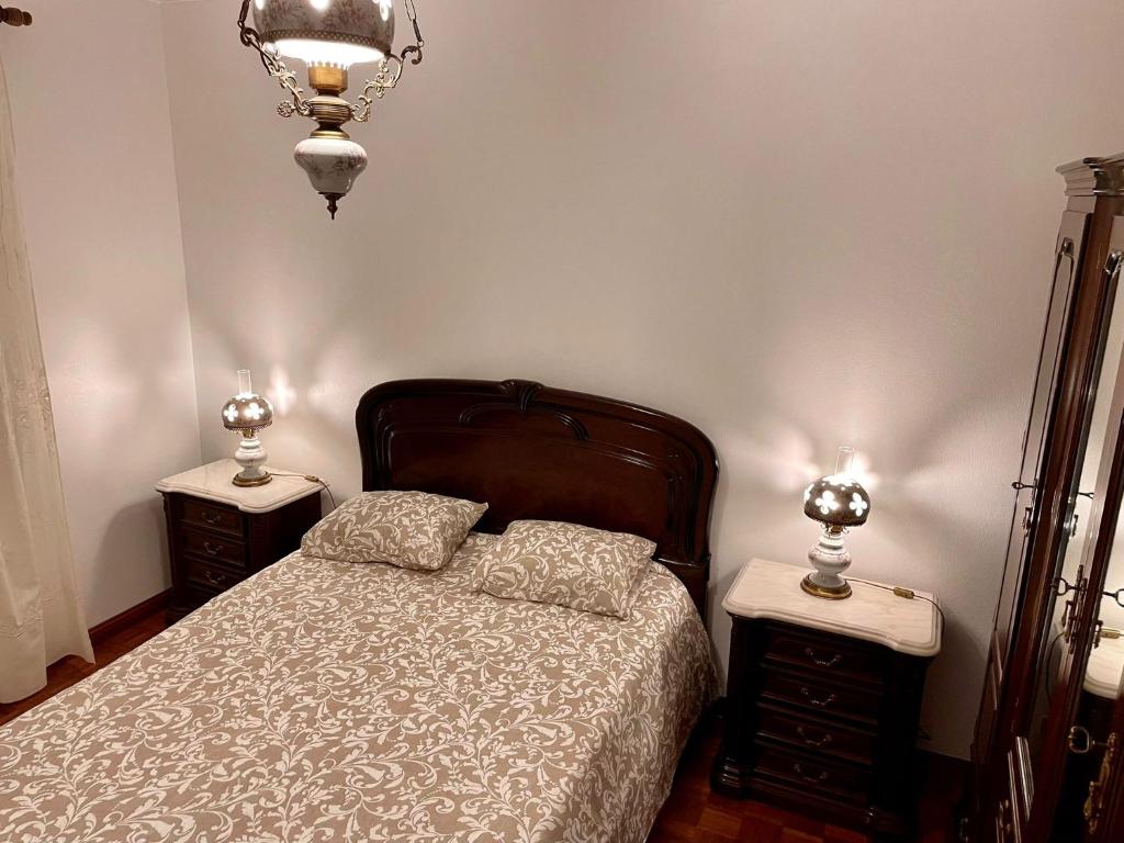 Postel nebo postele na pokoji v ubytování Casa Às Nove