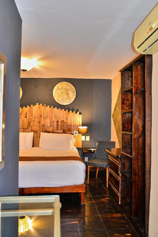 Postel nebo postele na pokoji v ubytování Hotel Mesones 49
