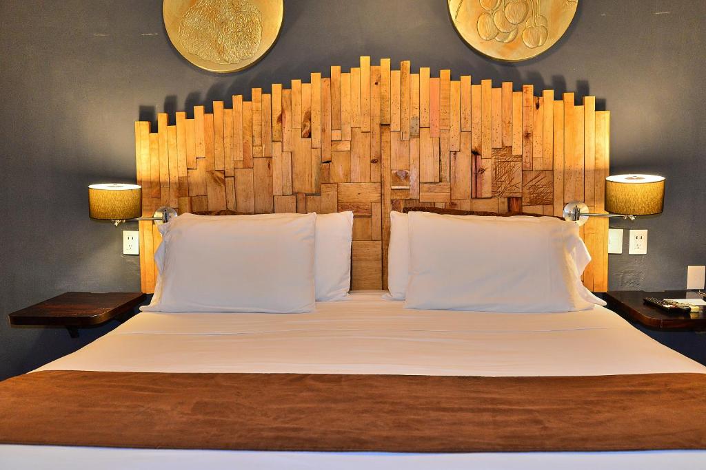 Postel nebo postele na pokoji v ubytování Hotel Mesones 49
