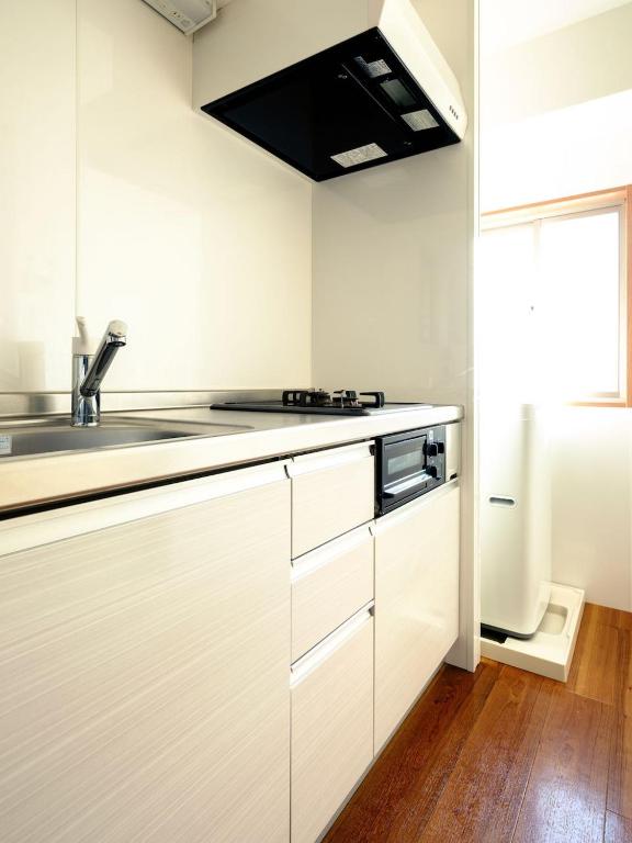 Kuchyň nebo kuchyňský kout v ubytování City Hideout
