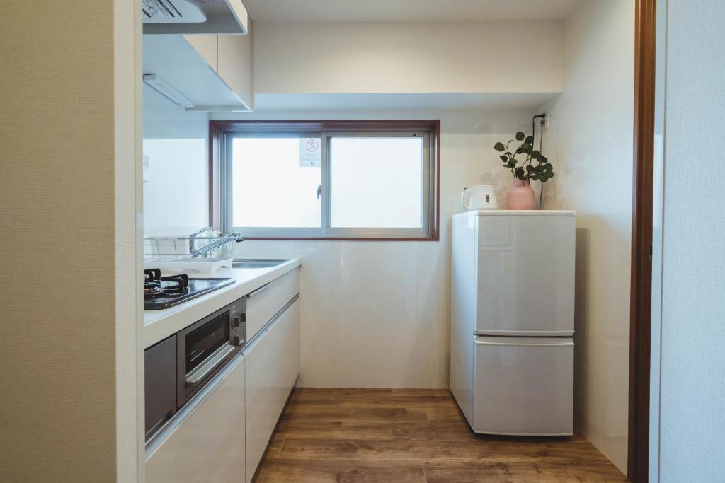 Kuchyň nebo kuchyňský kout v ubytování City Hideout
