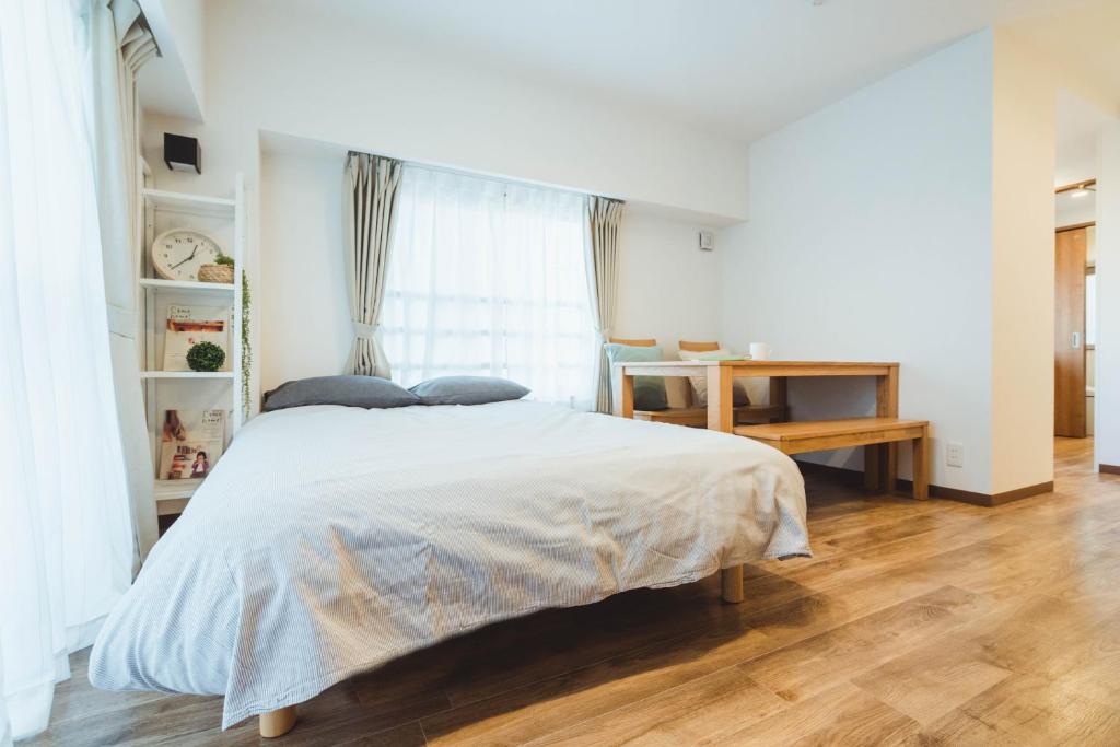 Postel nebo postele na pokoji v ubytování City Hideout