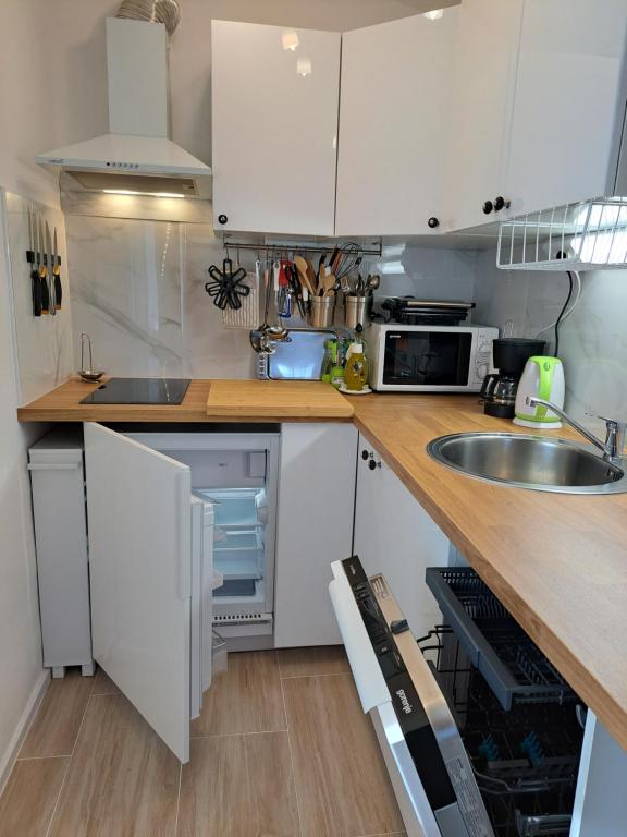 Kuchyň nebo kuchyňský kout v ubytování Holiday Home Ulika