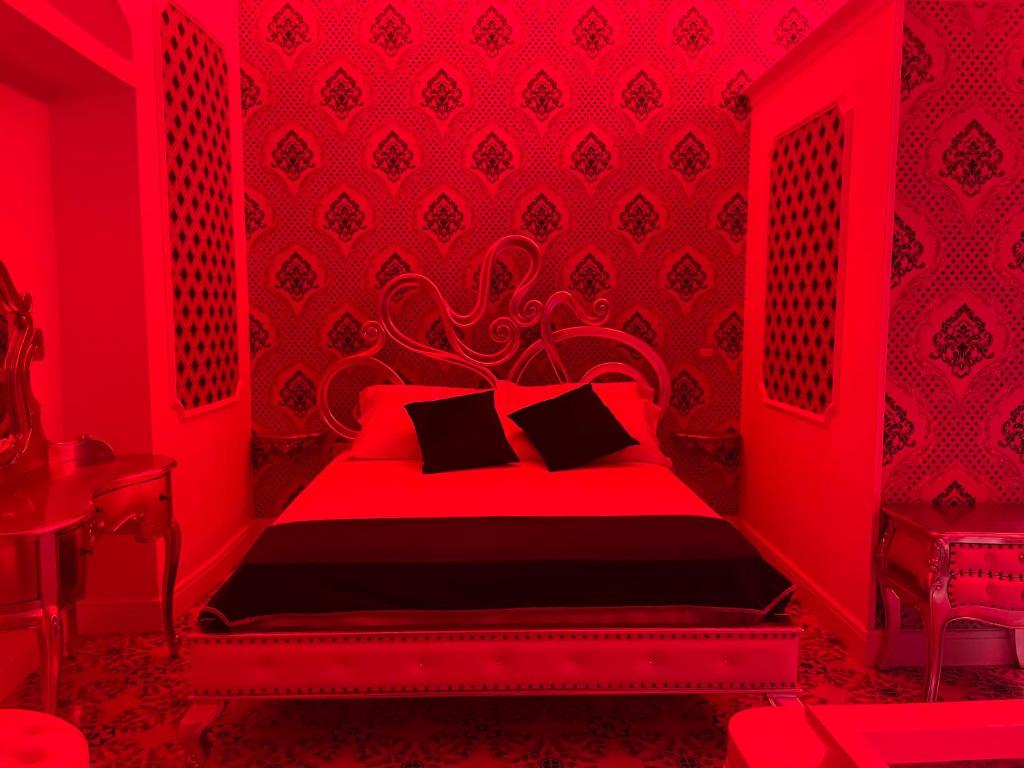 Łóżko lub łóżka w pokoju w obiekcie Mirage Rooms