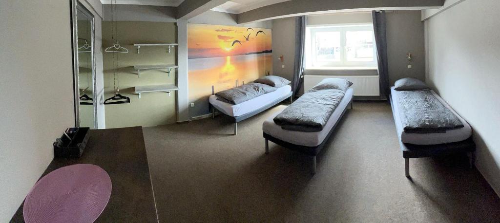 Posezení v ubytování Hostel Fehmarn Mehrbett-Zimmer