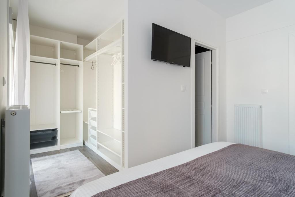 TV a/nebo společenská místnost v ubytování Home is