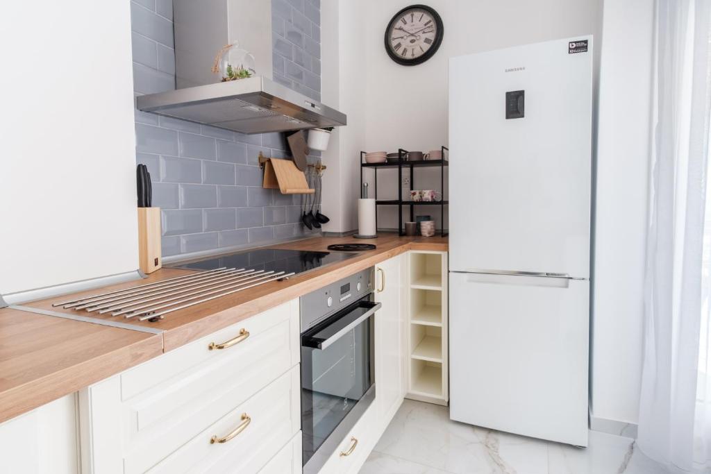 Kuchyň nebo kuchyňský kout v ubytování Home is
