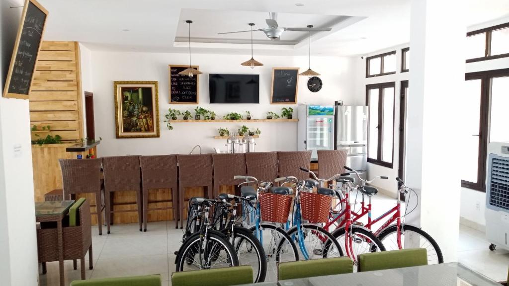 a group of bikes parked in a restaurant at Halong & Me Hometel Double Room in Ha Long