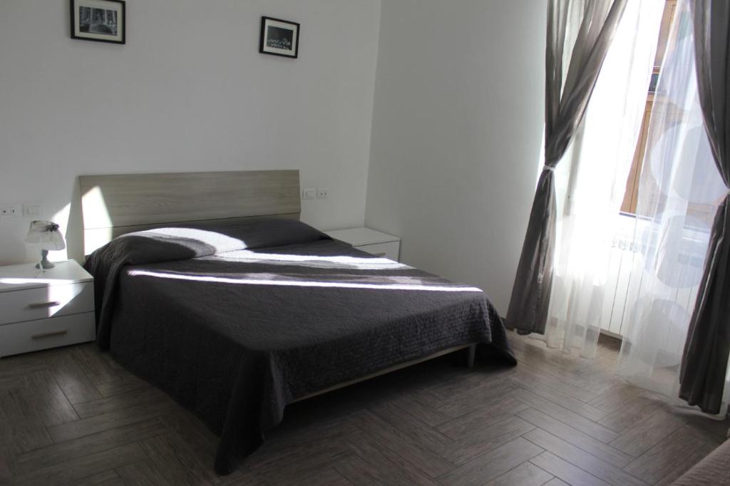 A bed or beds in a room at La residenza del Principe