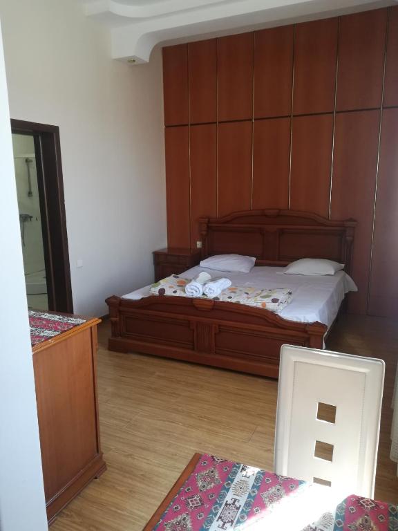 Postel nebo postele na pokoji v ubytování NEW BELLA HOTEL