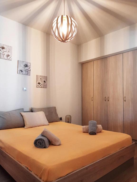 Postel nebo postele na pokoji v ubytování Villa Adeiata
