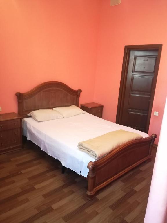 Postel nebo postele na pokoji v ubytování NEW BELLA HOTEL