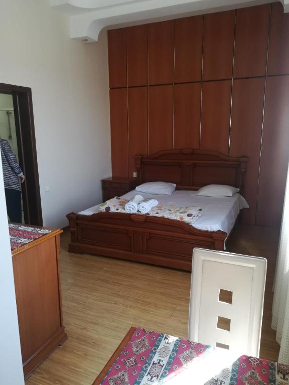 Postel nebo postele na pokoji v ubytování NEW BELLA HOTEL
