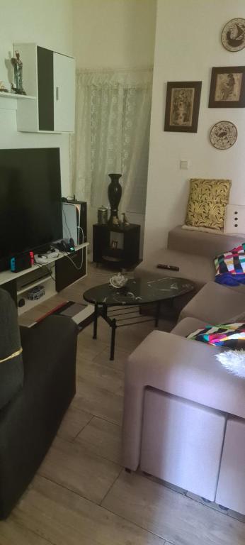 TV a/nebo společenská místnost v ubytování VALENCIA