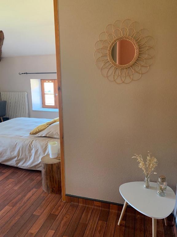 Postel nebo postele na pokoji v ubytování L'Estampille