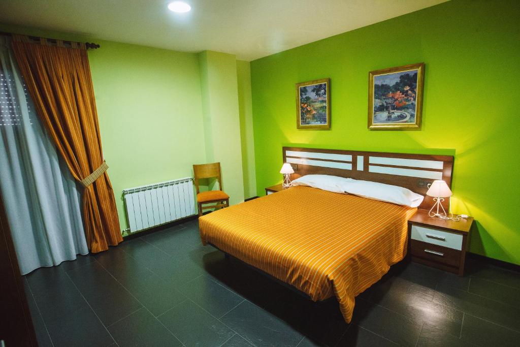 Cama o camas de una habitación en Hotel Rural el Pasil