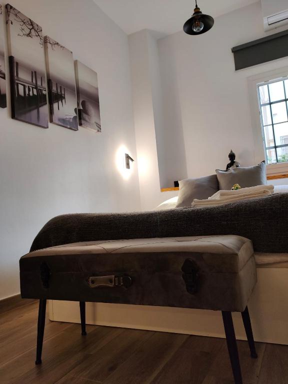 Posteľ alebo postele v izbe v ubytovaní Budha Luxury Apartment Centro Histórico de Málaga