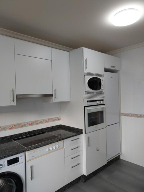 Kuchyň nebo kuchyňský kout v ubytování Apartamento Calzada Romana