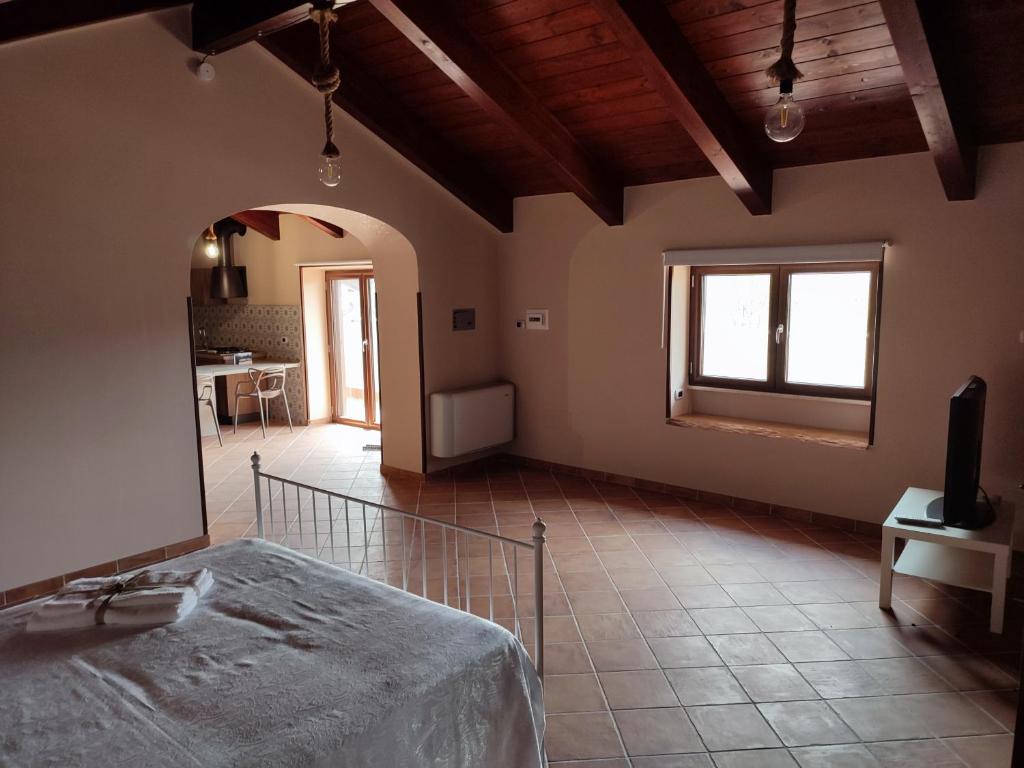 A bed or beds in a room at Masseria Le Zavattole