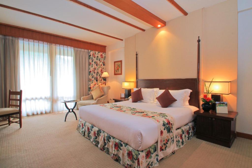 Postel nebo postele na pokoji v ubytování Belle Villa Resort, Chiang Mai