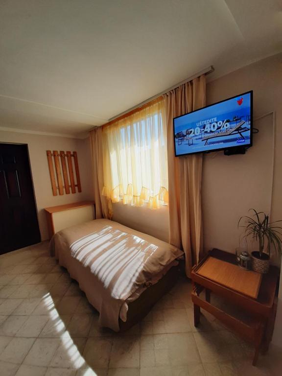 Postel nebo postele na pokoji v ubytování Apartman Cherry Gradac Valjevo