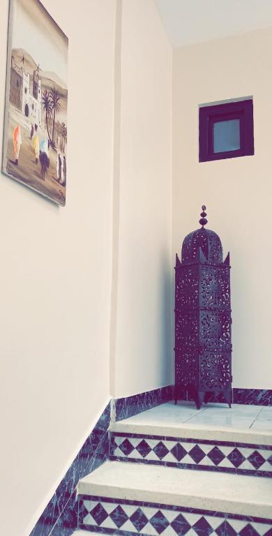 Postel nebo postele na pokoji v ubytování Riad Nour Resorts-Riad Nour Travel