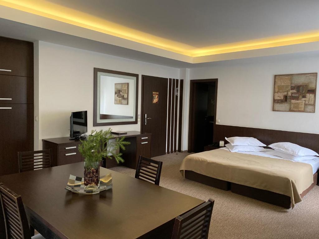 Postel nebo postele na pokoji v ubytování Hotel Smart