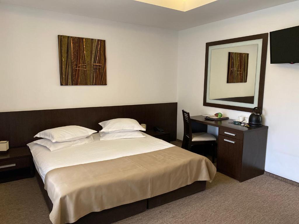 Postel nebo postele na pokoji v ubytování Hotel Smart