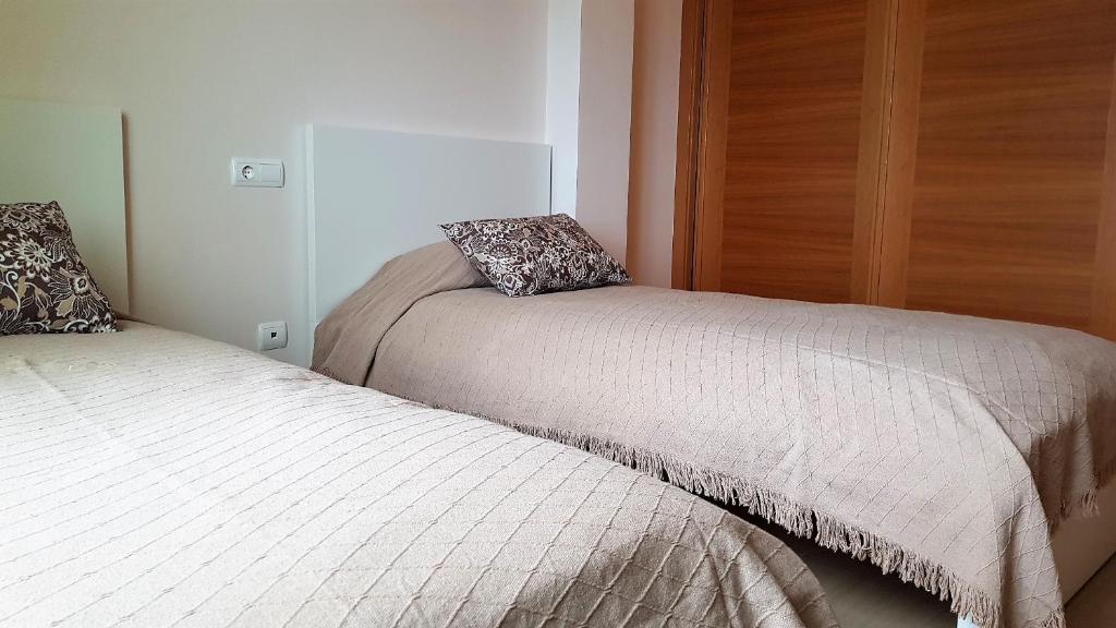 Posteľ alebo postele v izbe v ubytovaní Okeanos fantastic 2 bedrooms VR-PN