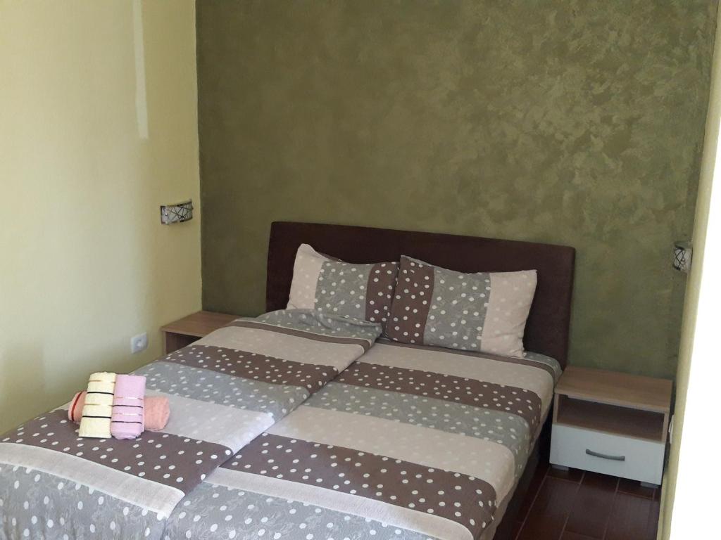 Postel nebo postele na pokoji v ubytování Kazablanka Rooms Aerodrom