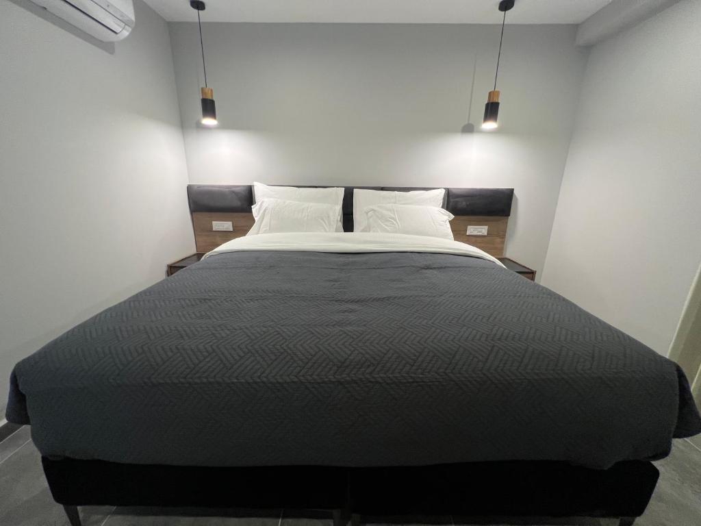 Postel nebo postele na pokoji v ubytování בוטיק רפאל Boutique Rafael