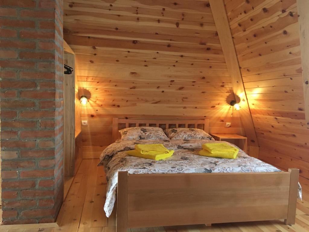 Postel nebo postele na pokoji v ubytování Mašine kolibe