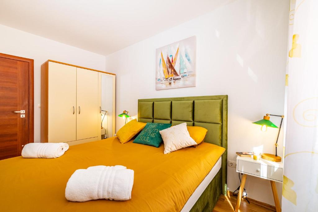 Postel nebo postele na pokoji v ubytování Apartment Nekić Posedarje