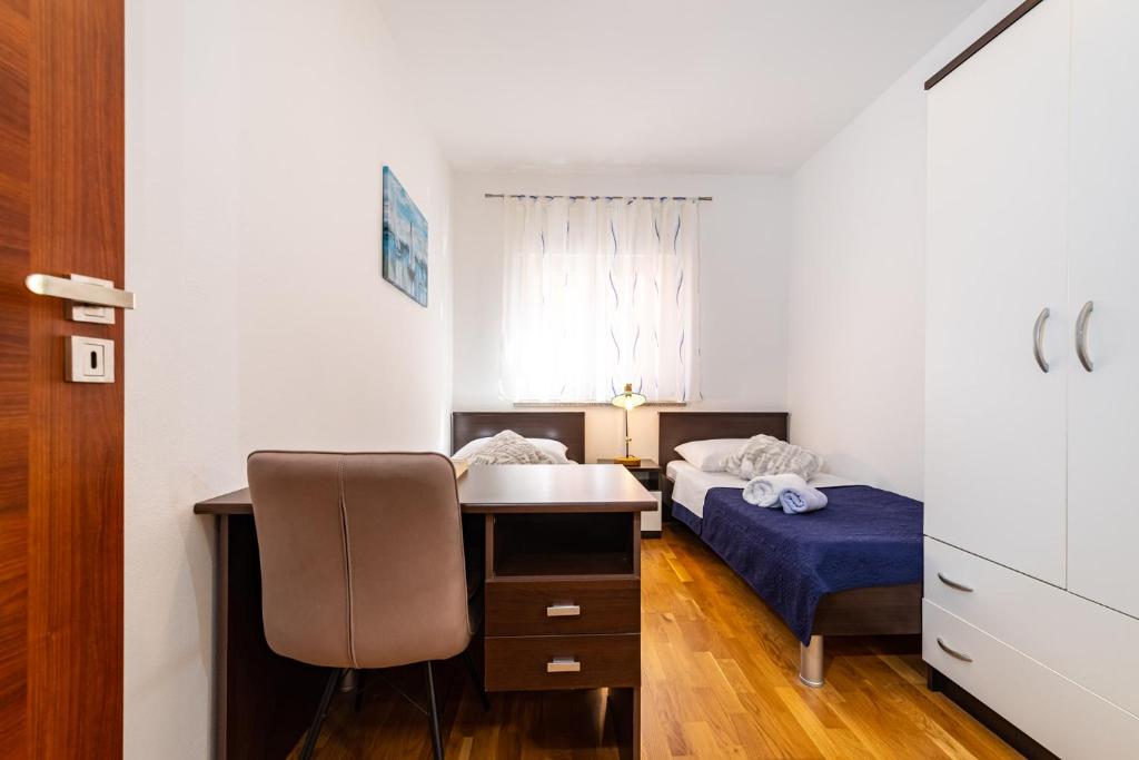 Postel nebo postele na pokoji v ubytování Apartment Nekić Posedarje