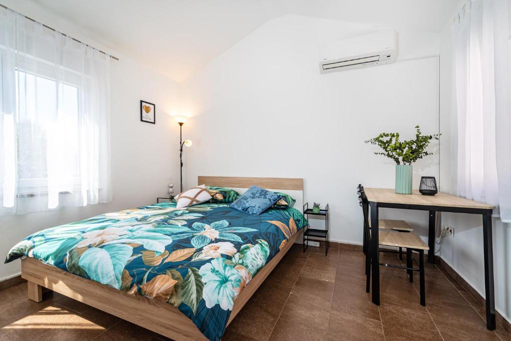 Postel nebo postele na pokoji v ubytování Apartment Nekić Posedarje