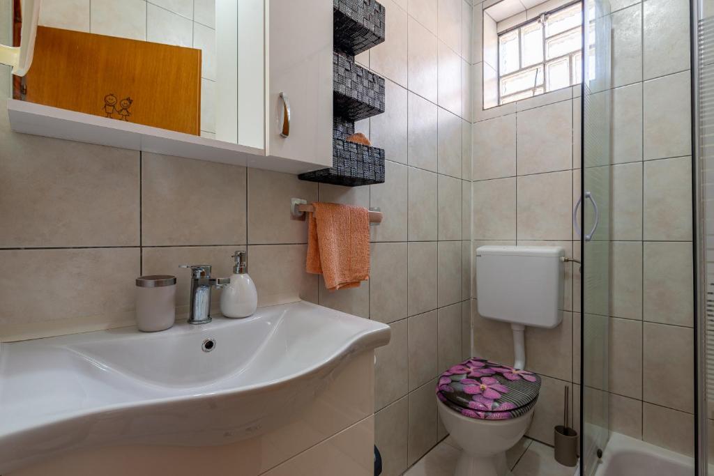 Kúpeľňa v ubytovaní Apartments Villa Agape Vir