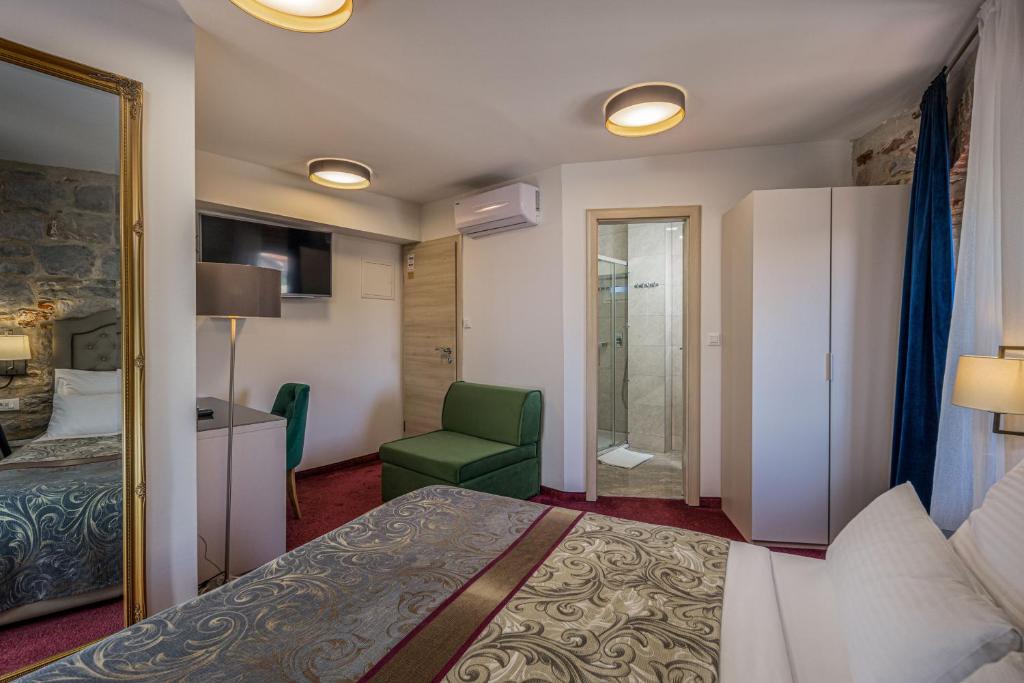 Postel nebo postele na pokoji v ubytování Hotel Agava Split