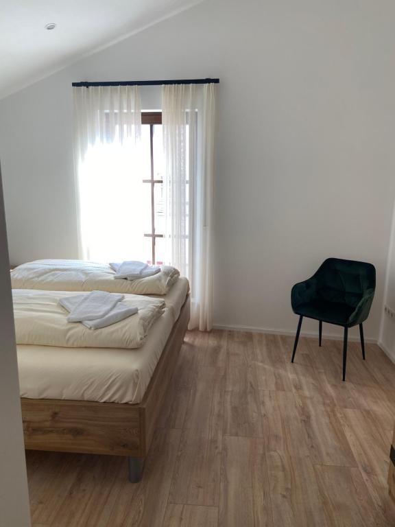 Postel nebo postele na pokoji v ubytování Der Limes Kipfenberg