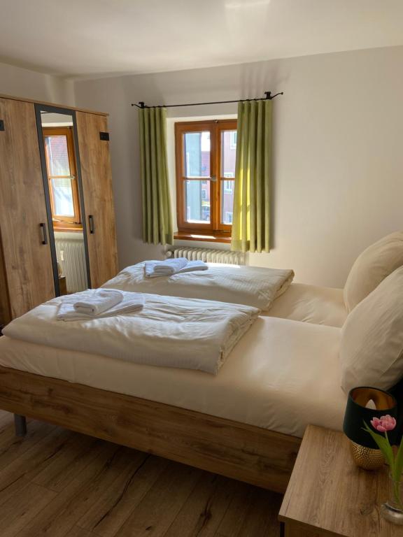 Postel nebo postele na pokoji v ubytování Der Limes Kipfenberg