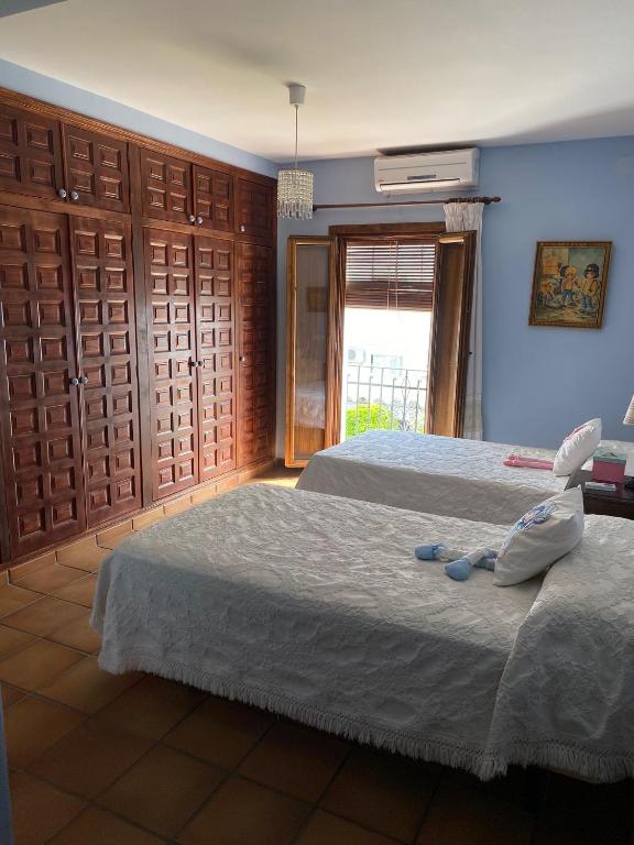 Posteľ alebo postele v izbe v ubytovaní Casa Rural Mirador del Castillo