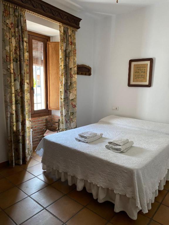 Posteľ alebo postele v izbe v ubytovaní Casa Rural Mirador del Castillo