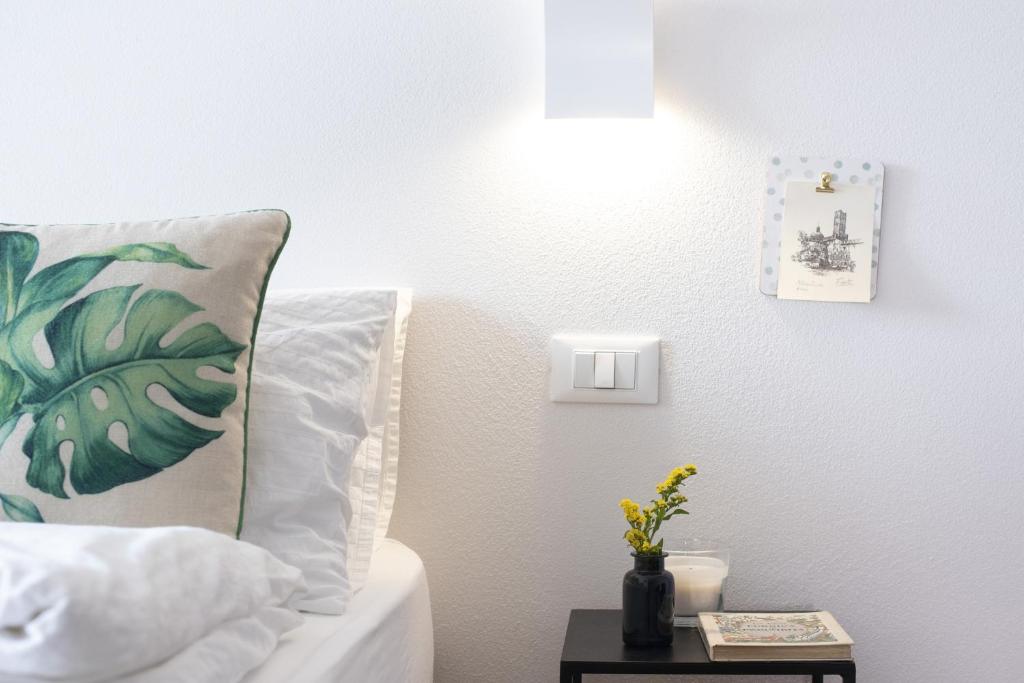 Postel nebo postele na pokoji v ubytování Sun Garda