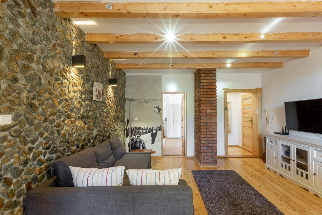 Telewizja i/lub zestaw kina domowego w obiekcie Apartamenty Pod Skocznią