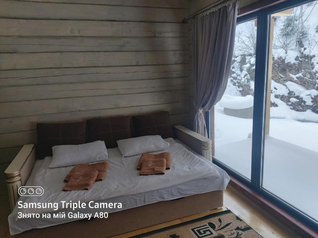 Postel nebo postele na pokoji v ubytování Hotel Berloga-Sinevir