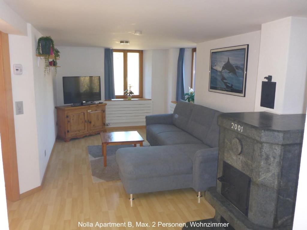 TV a/nebo společenská místnost v ubytování Nolla Apartment