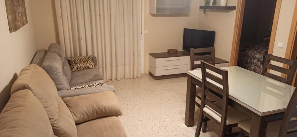 Televízia a/alebo spoločenská miestnosť v ubytovaní Apartamento Paseo Marítimo, Centro Torre del Mar