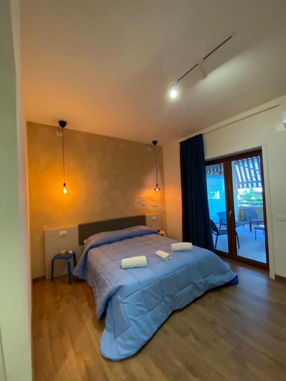 Posteľ alebo postele v izbe v ubytovaní Sorrento B&D Rooms