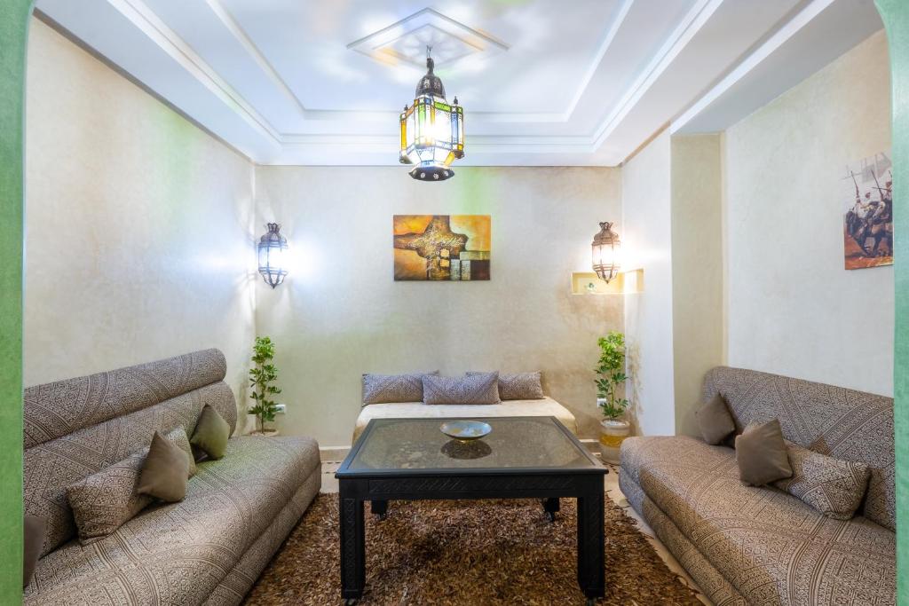 Uma área de estar em Riad Elite