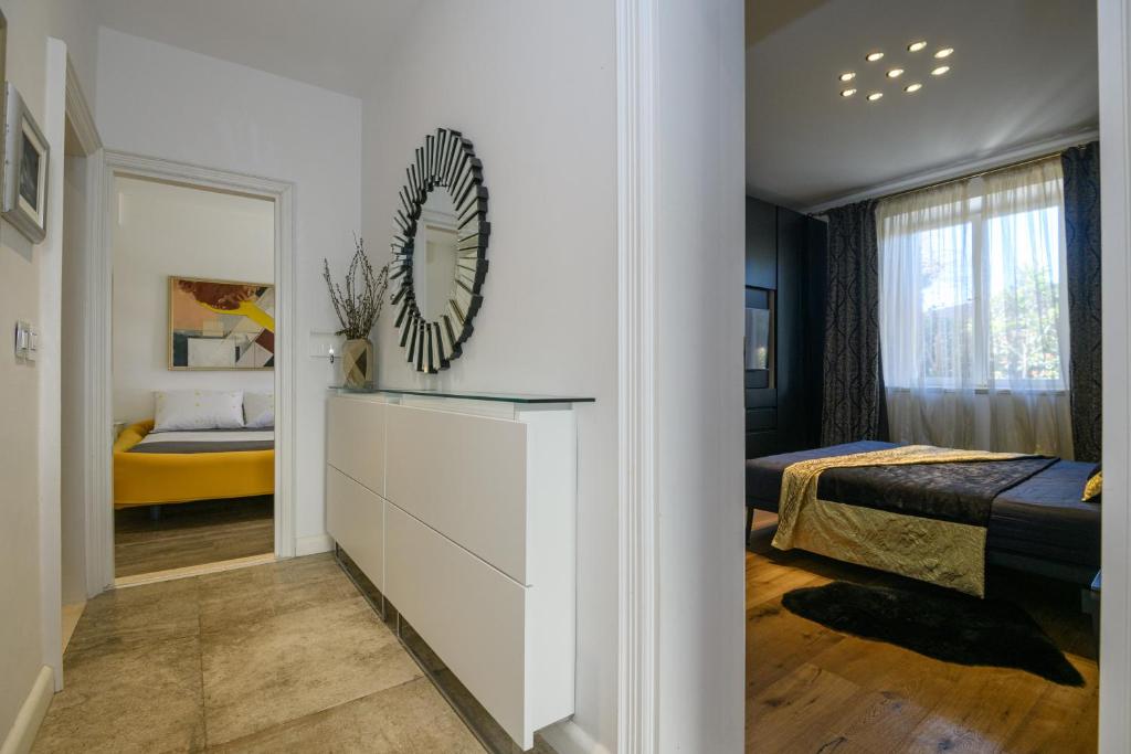 Postel nebo postele na pokoji v ubytování FRAMAR apartment