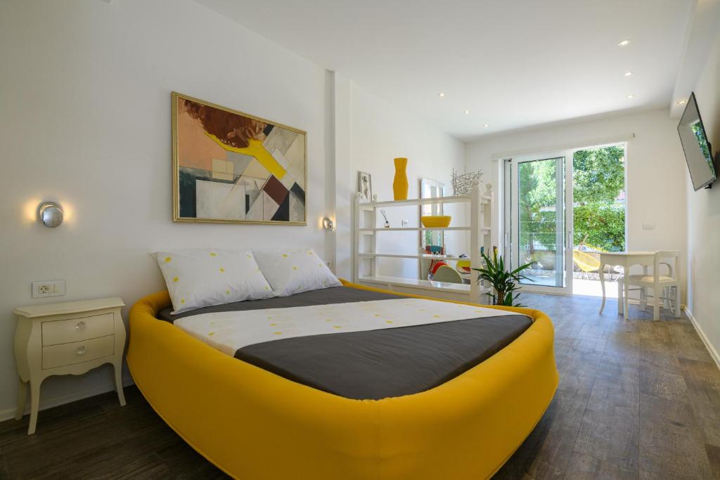 Postel nebo postele na pokoji v ubytování FRAMAR apartment